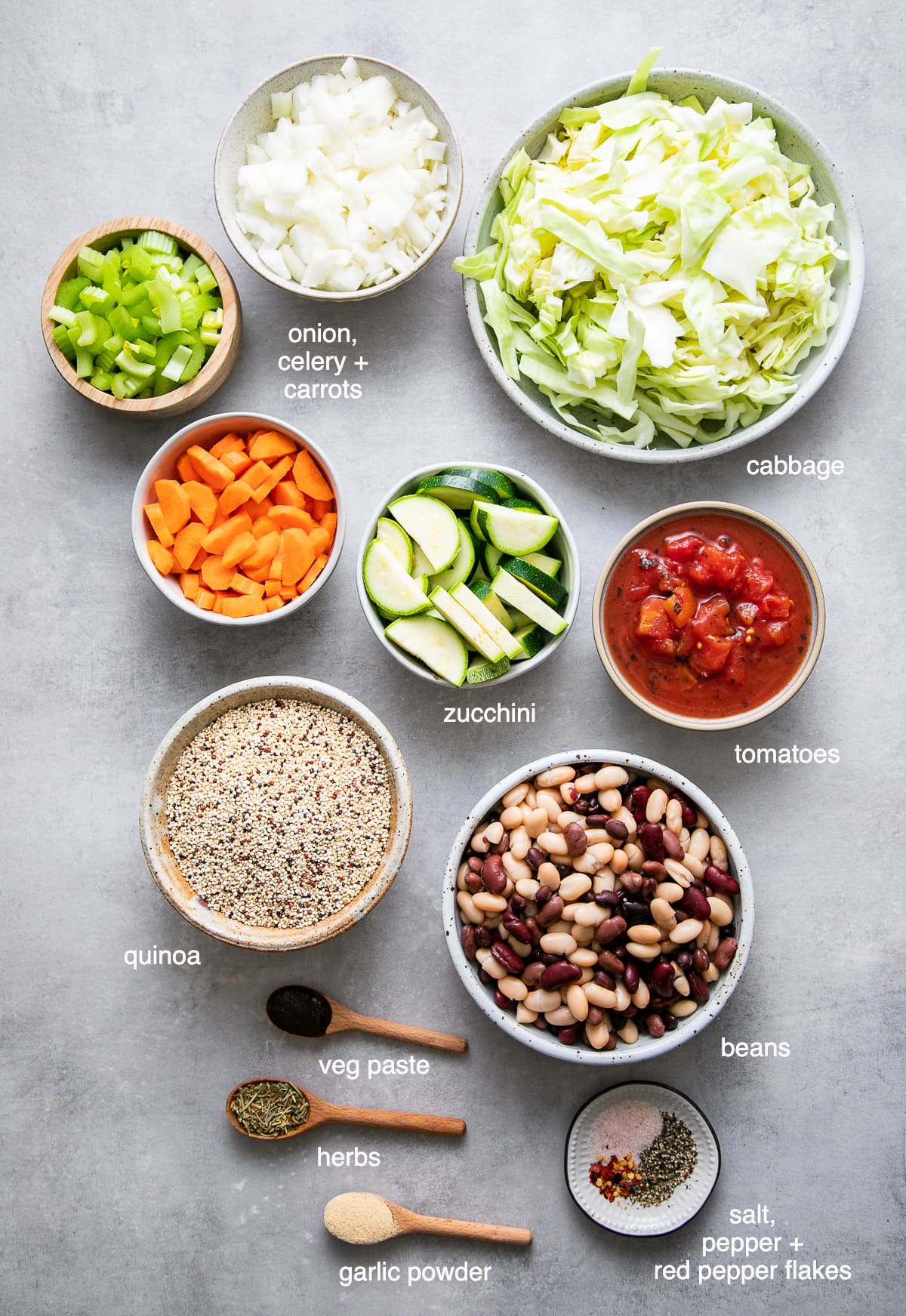 top down view of ingredients used to make healthy vegetable quinoa soup recipe.